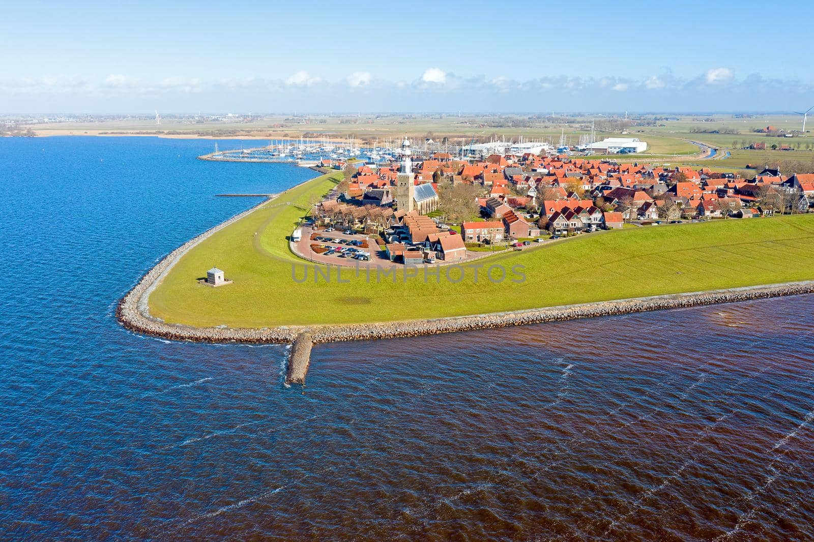 Aerial from the historical town Hindeloopen at the IJsselmeer in the Netherlands by devy