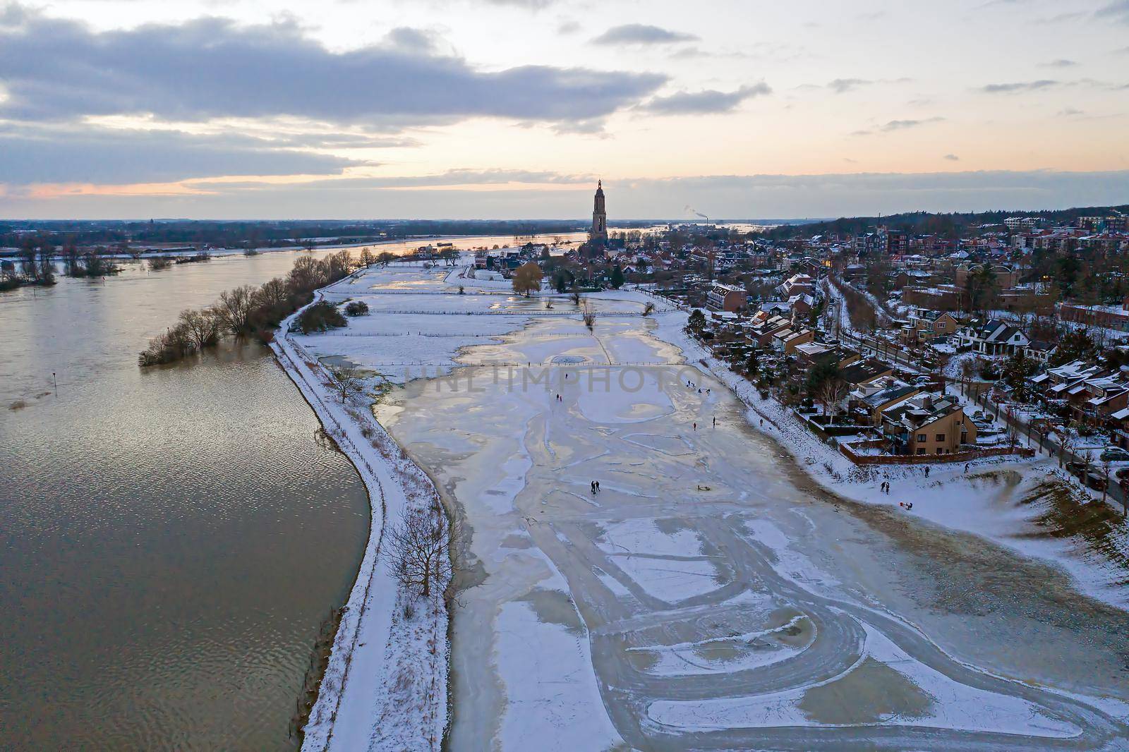 Aerial from the snowy city Rhenen in the Netherlands in winter by devy