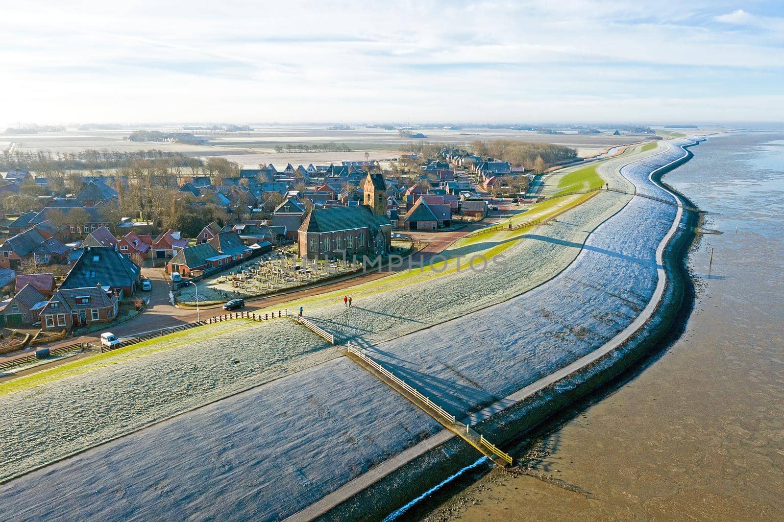 Aerial from the village Wierum on a beautiful winter day in the Netherlands by devy