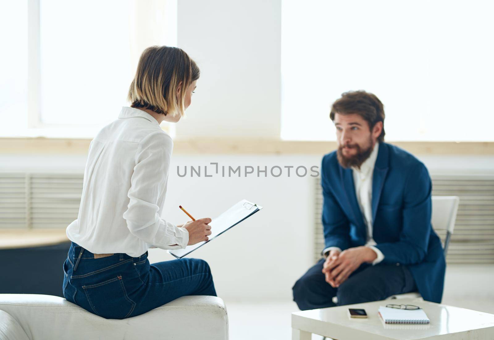 Woman psychologist talking with patient consultation diagnosis problem. High quality photo