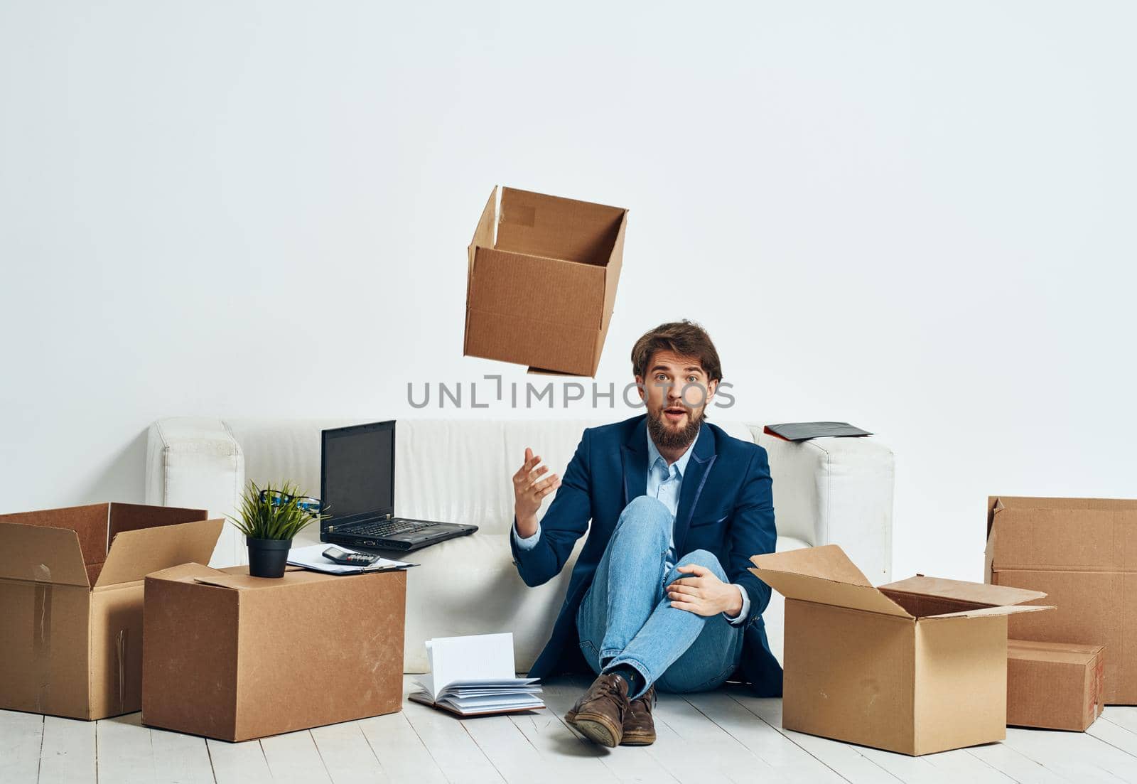 man with boxes packing dismissal job professional by SHOTPRIME