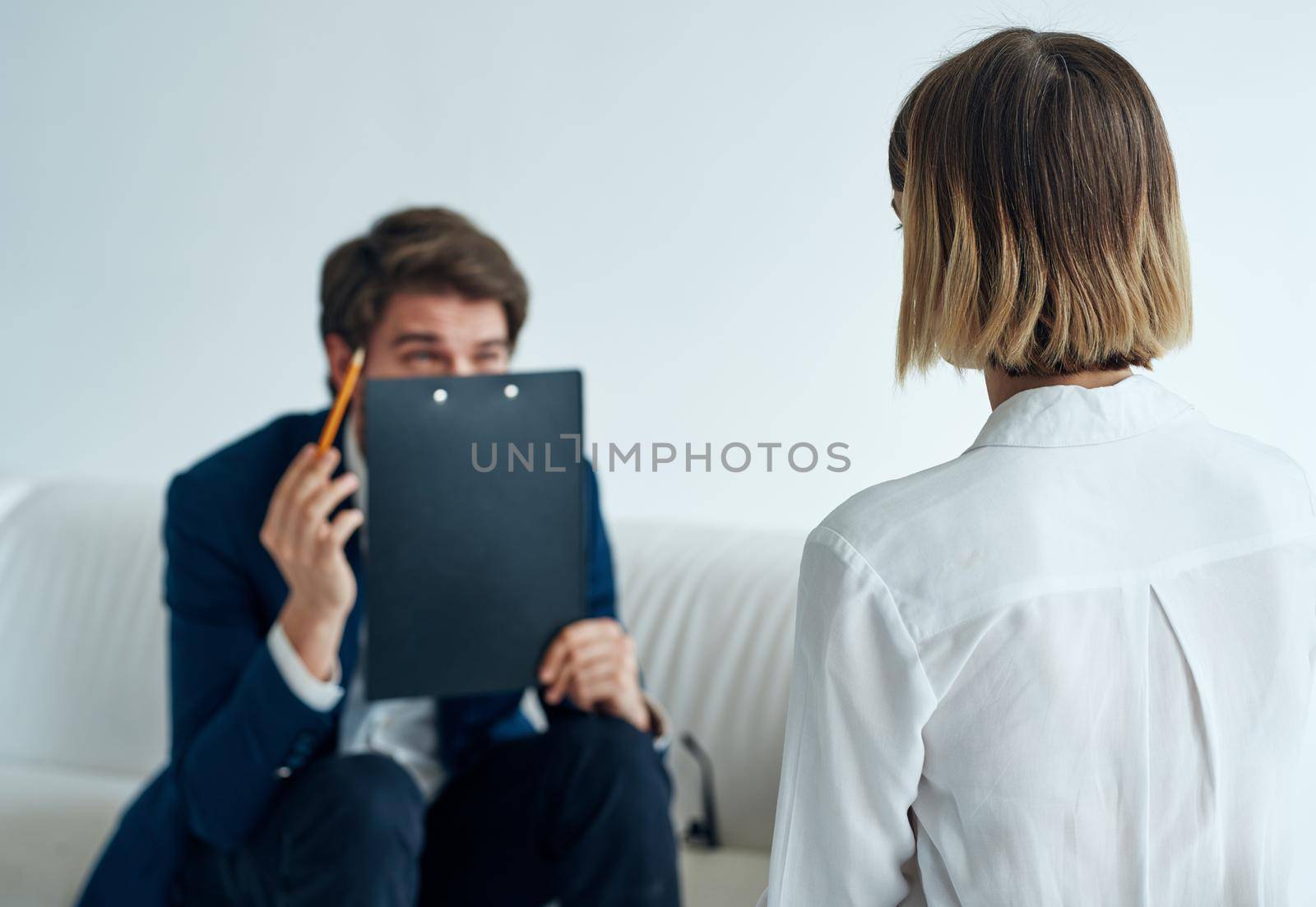 business man and woman communication officials office documents. High quality photo
