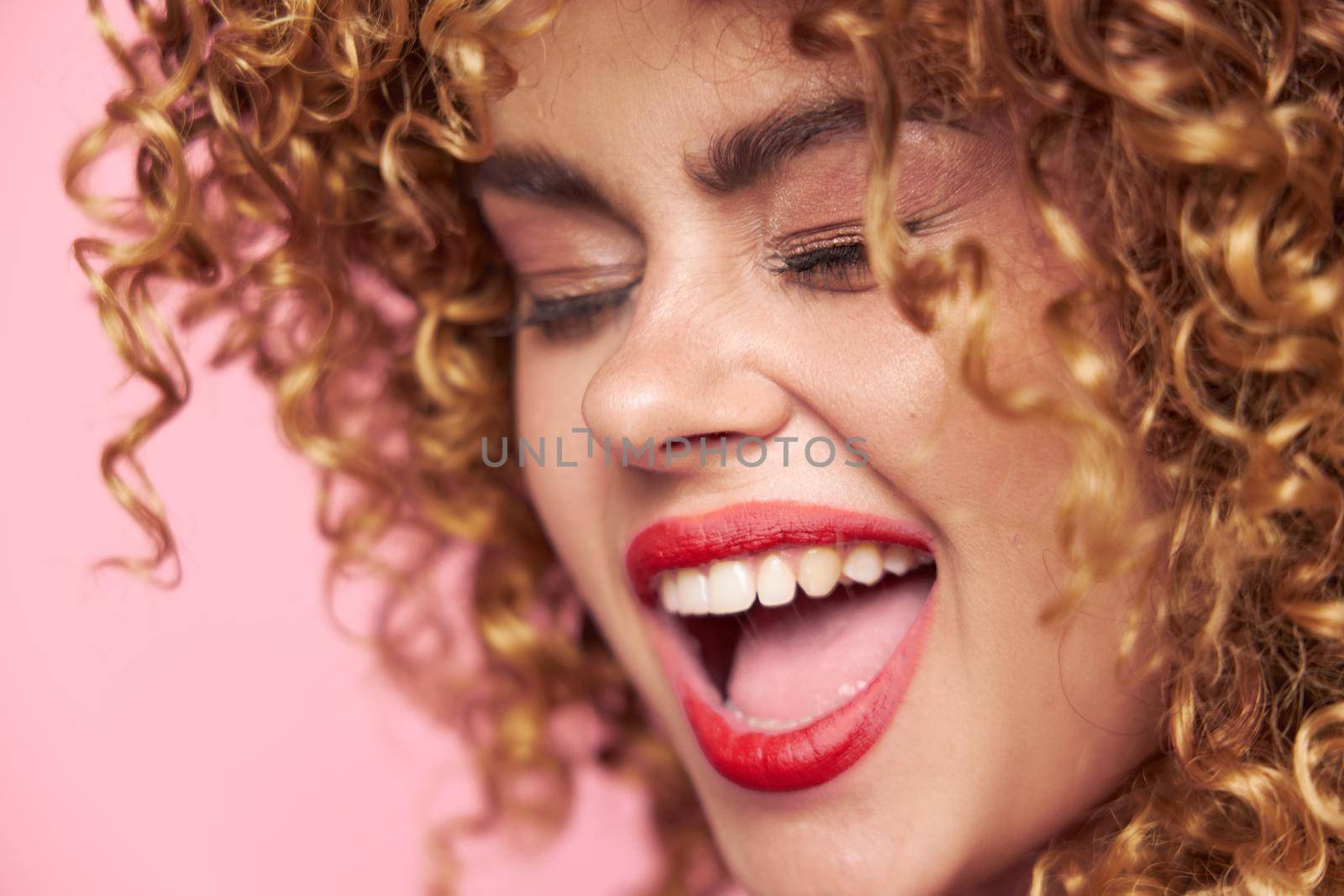 Attractive woman Curly hair closed eyes open mouth close-up charm by SHOTPRIME