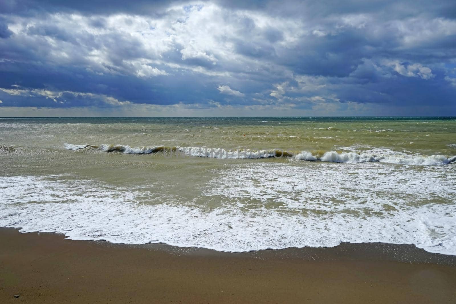 Marine landscape with a beautiful emerald waves. Sudak, Crimea.
