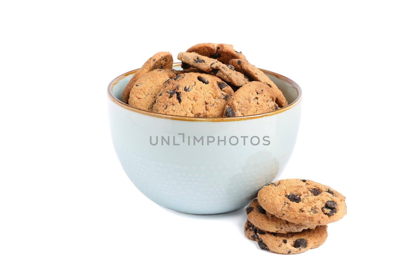 Bowl with tasty chocolate chip cookies on white background