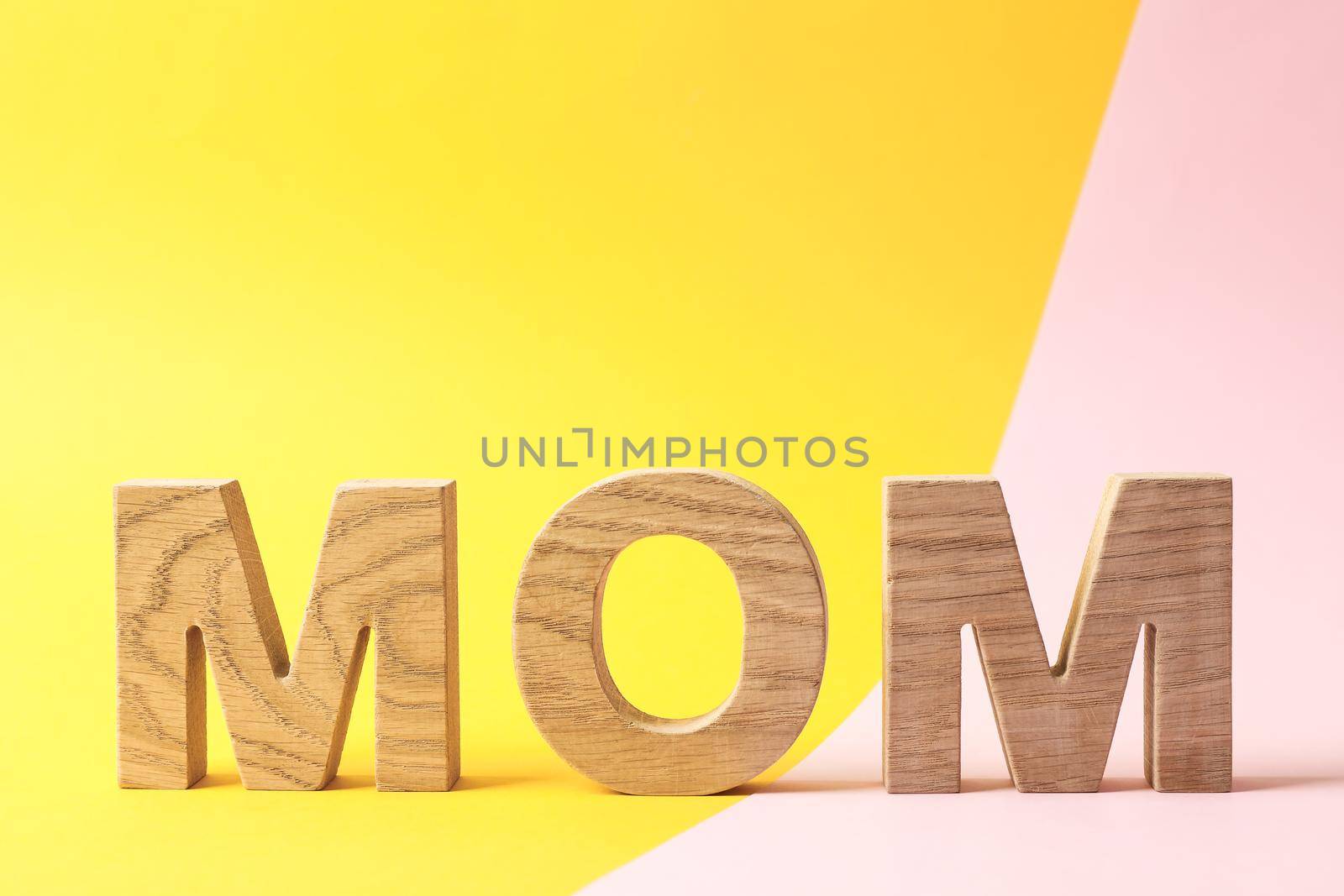 Inscription mom on two tone background, space for text by AtlasCompany