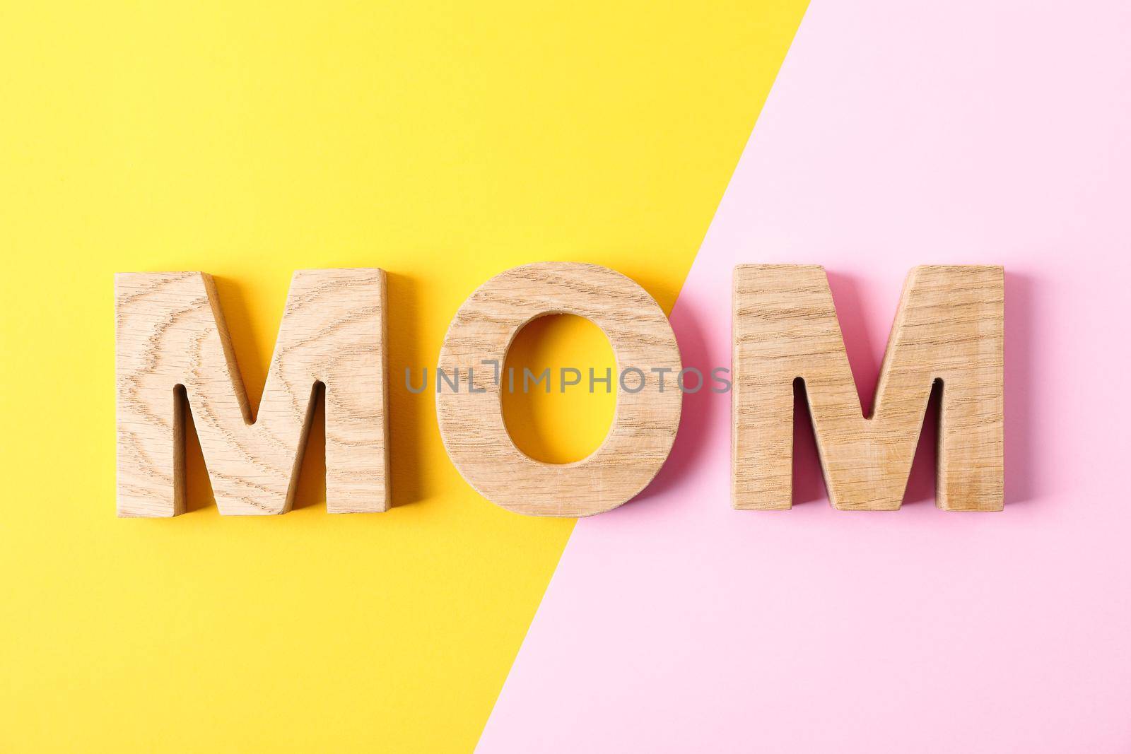 Inscription Mom on two tone background, space for text by AtlasCompany