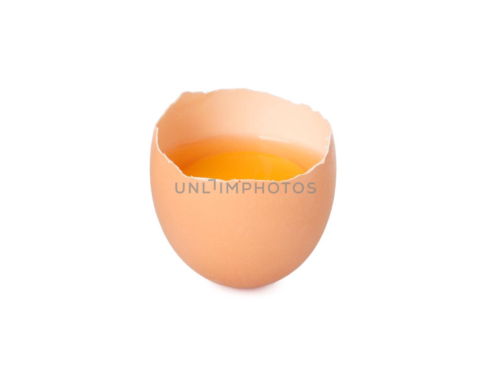 Half broken egg with yolk isolated on white background