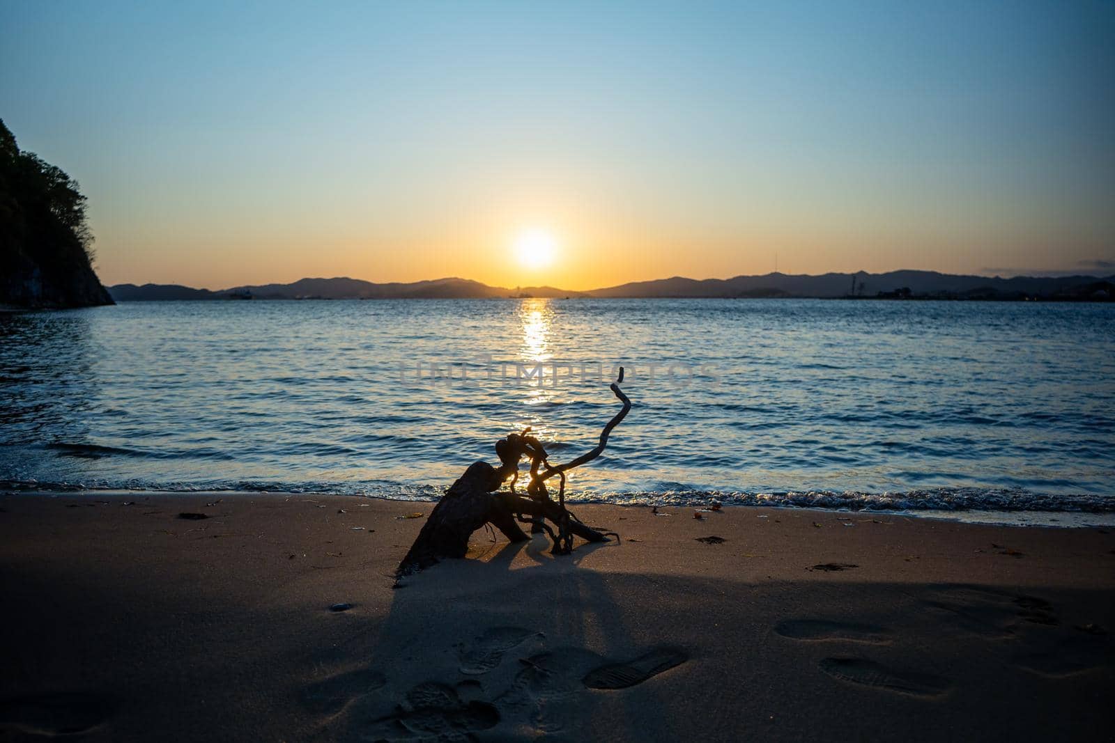 Marine landscape with views of a beautiful sunset. Nakhodka Bay, Russia
