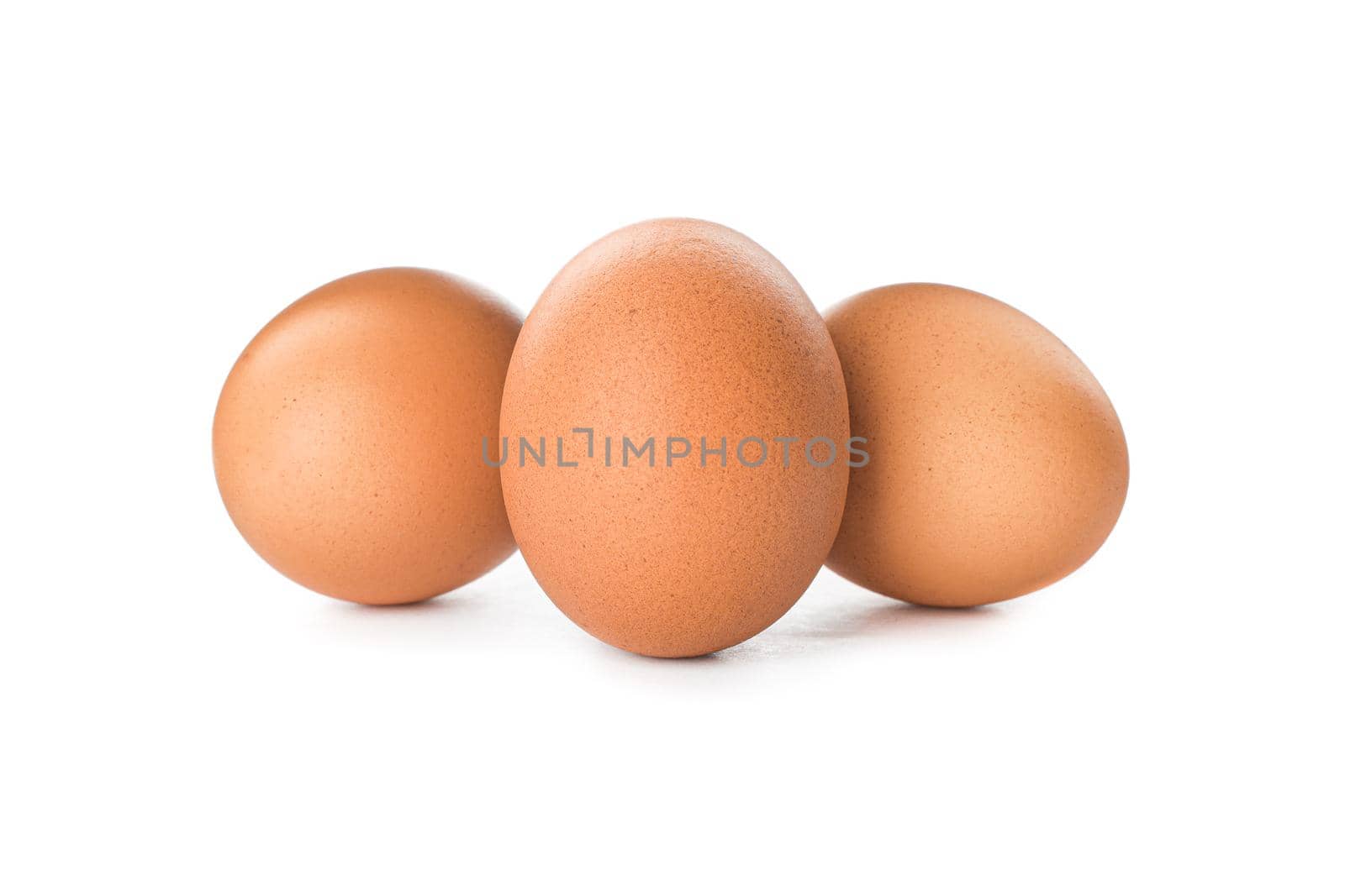 Brown chicken eggs isolated on white background