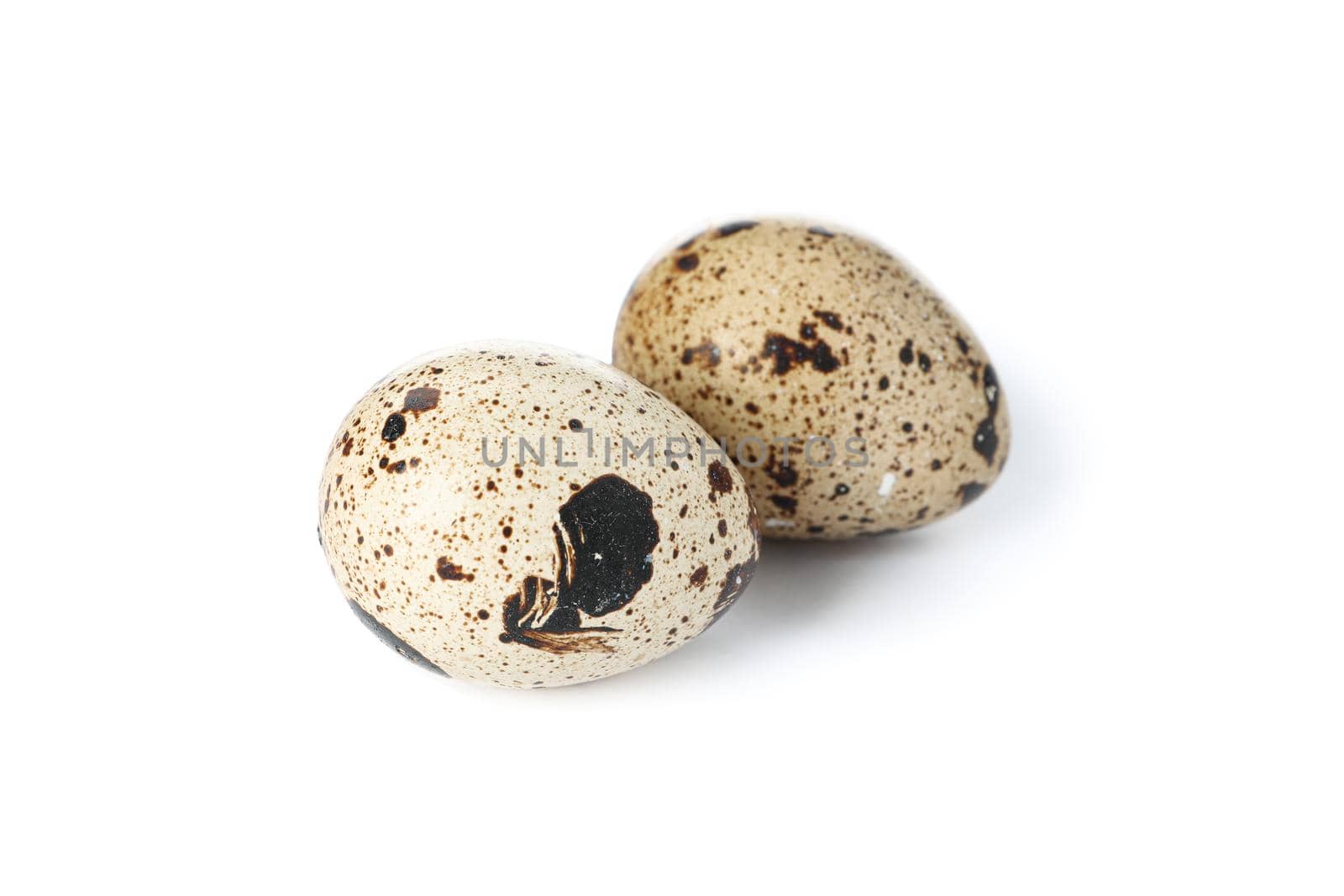 Raw quail eggs isolated on white background