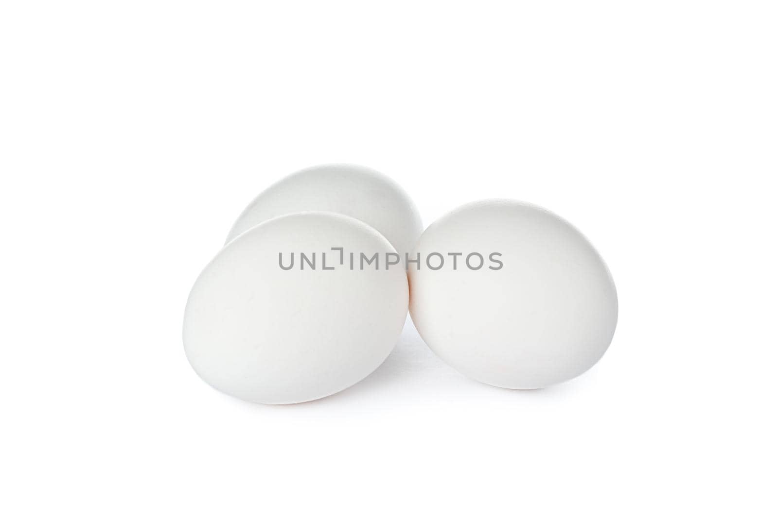 White chicken eggs isolated on white background