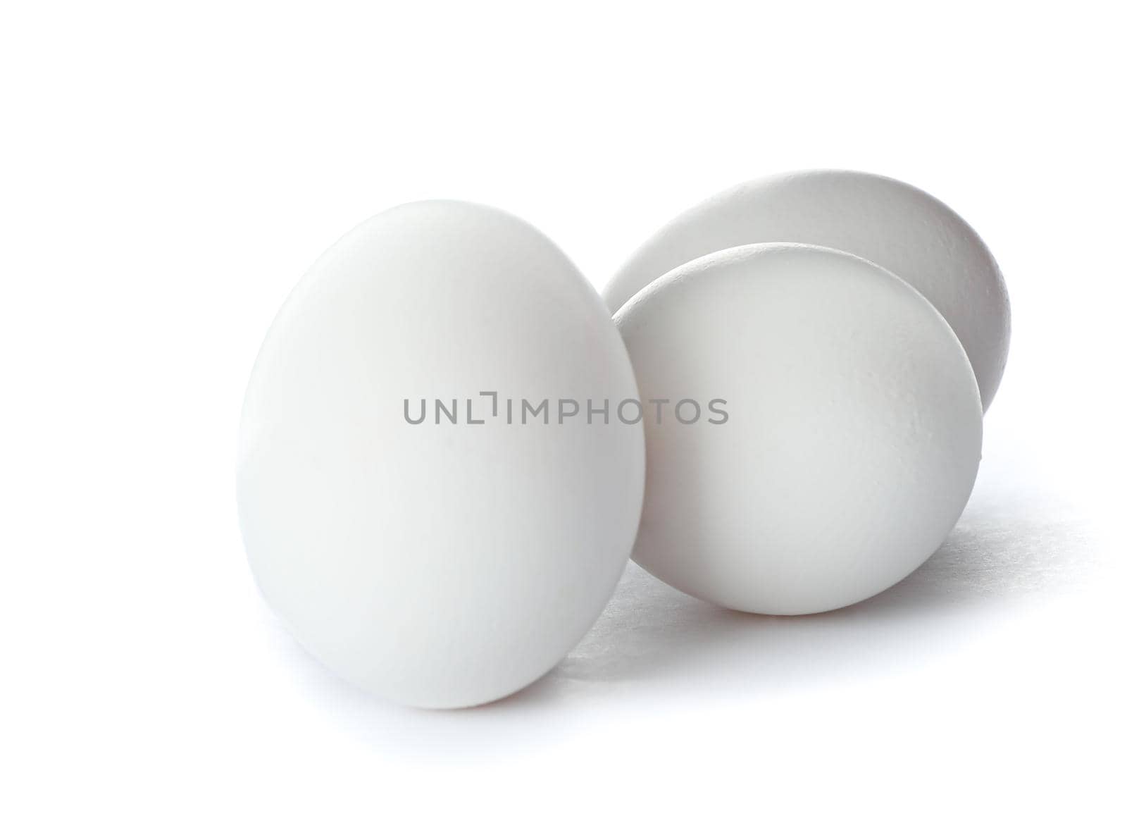 White chicken eggs isolated on white background by AtlasCompany