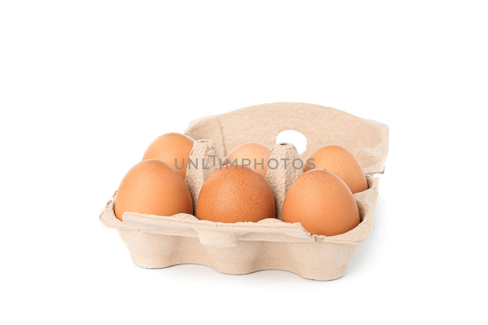 Brown chicken eggs in carton box isolated on white background by AtlasCompany