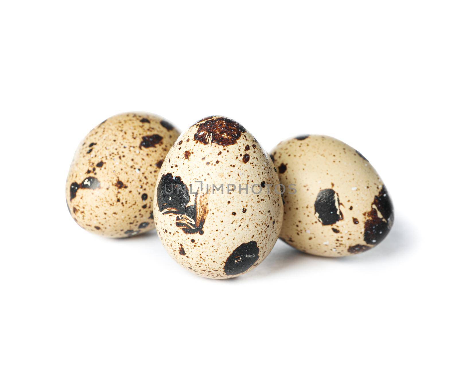 Raw quail eggs isolated on white background