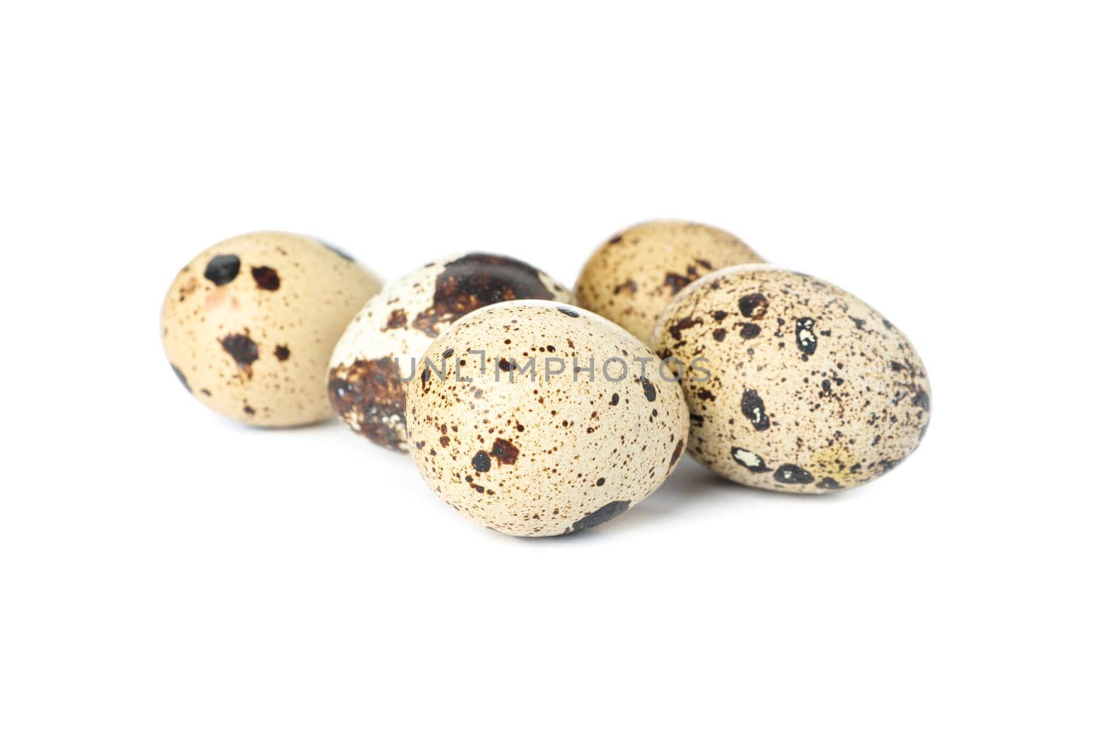 Raw quail eggs isolated on white background