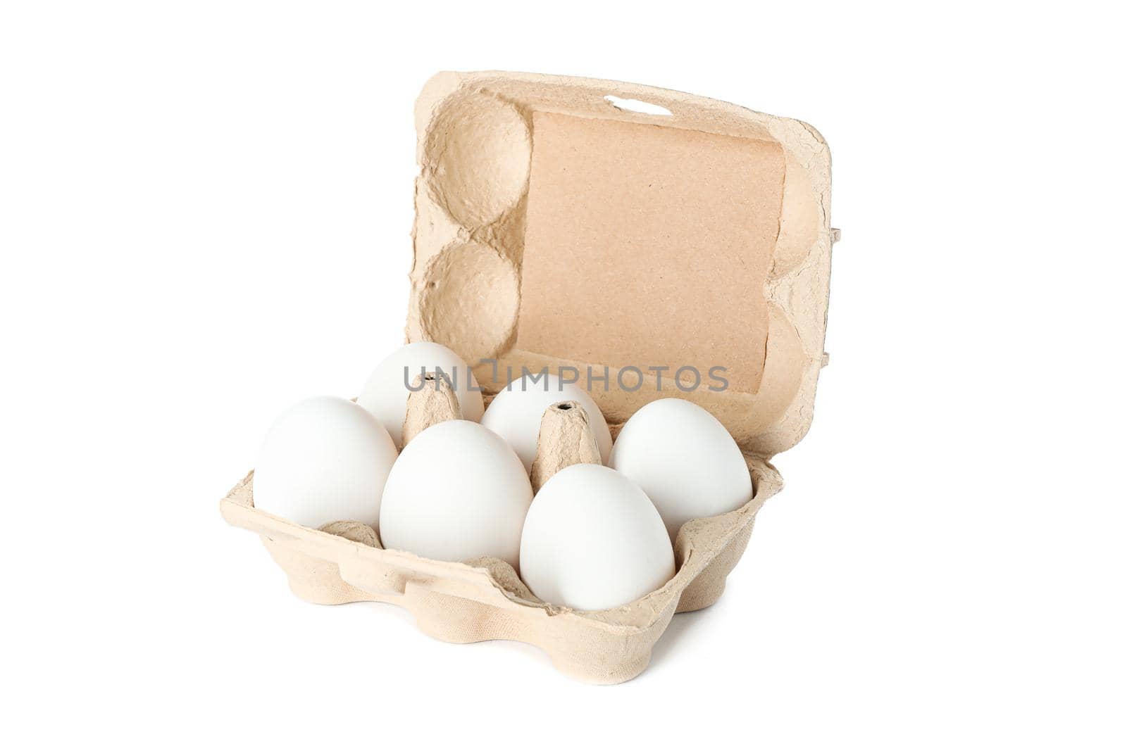 White chicken eggs in carton box isolated on white background