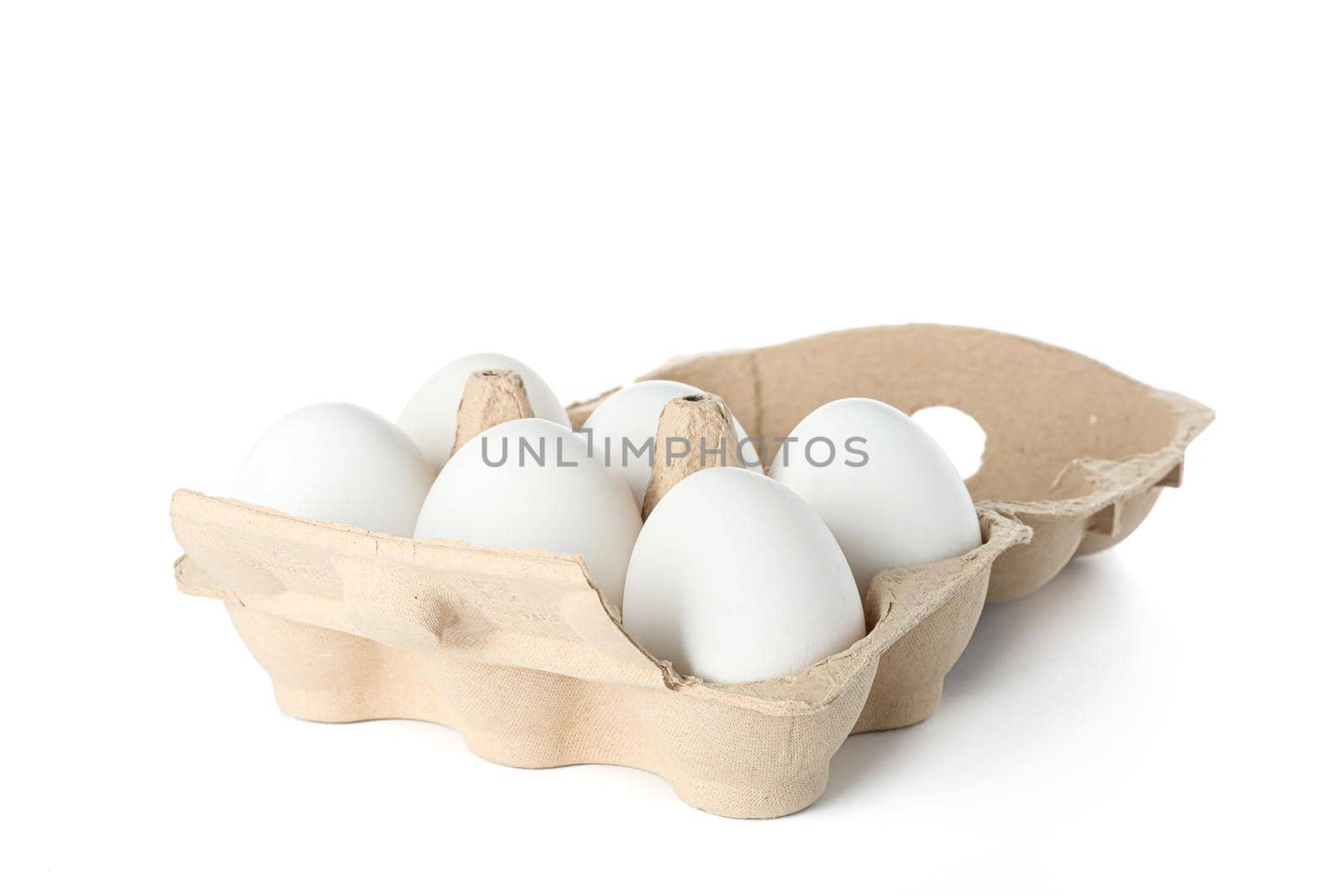 White chicken eggs in carton box isolated on white background