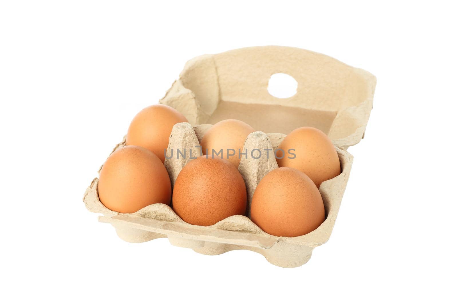 Few raw chicken eggs in carton box on white background