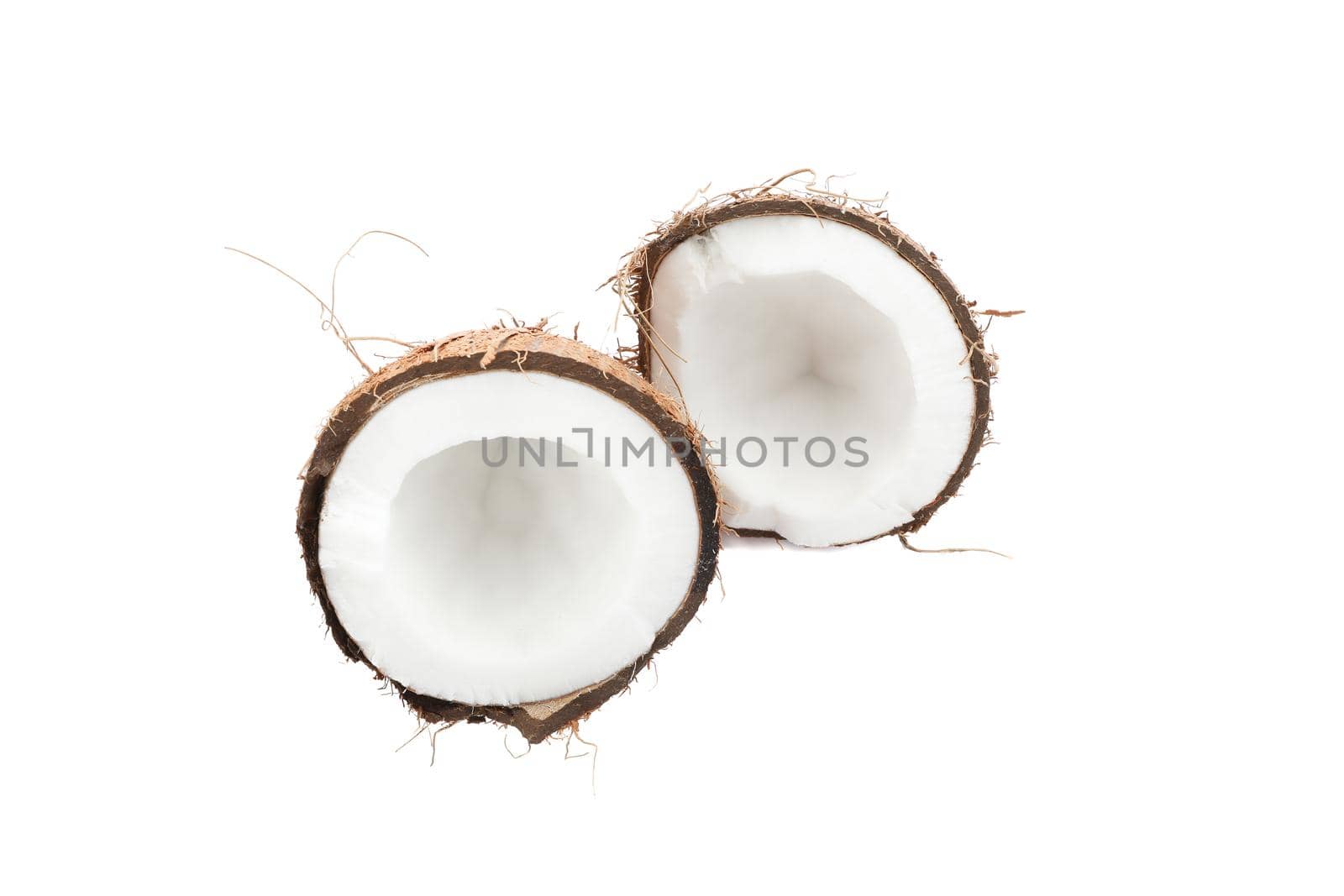 Split tropical coconut isolated on white background