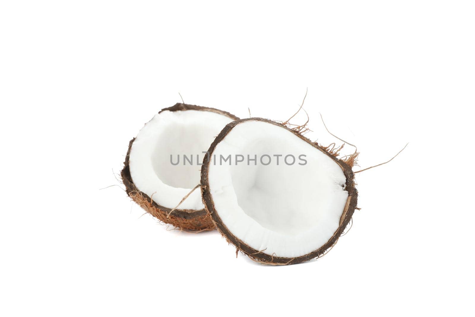 Split tropical coconut isolated on white background