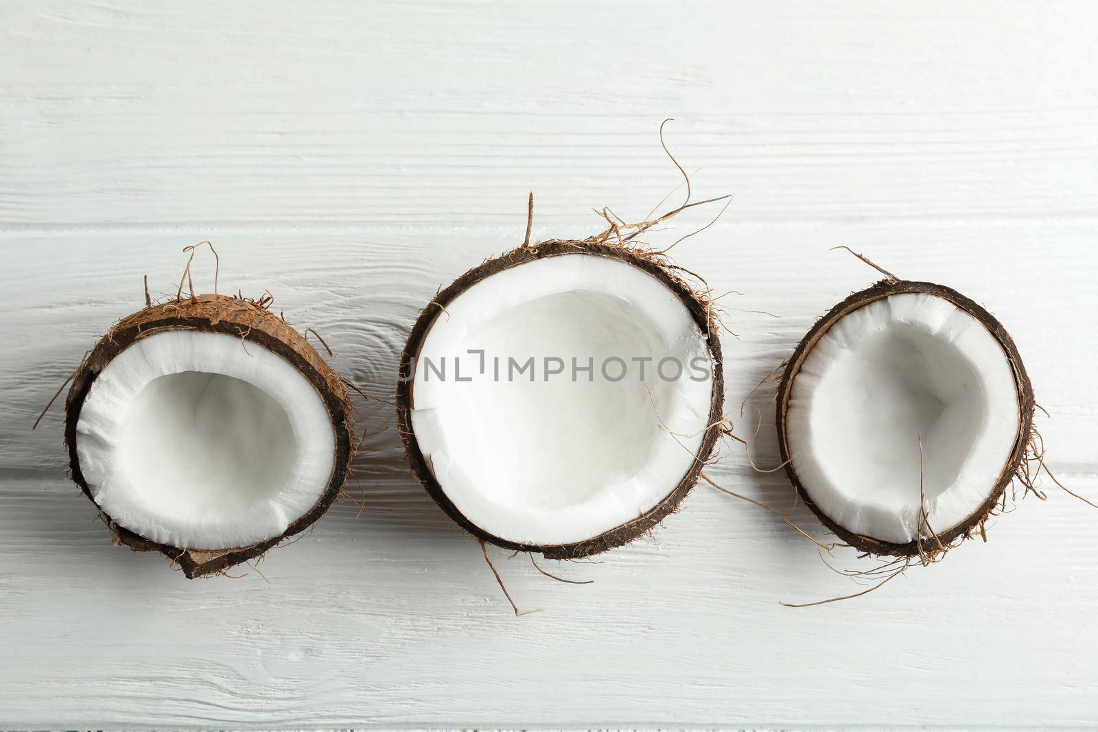 Tropical coconuts on white background, space for text by AtlasCompany