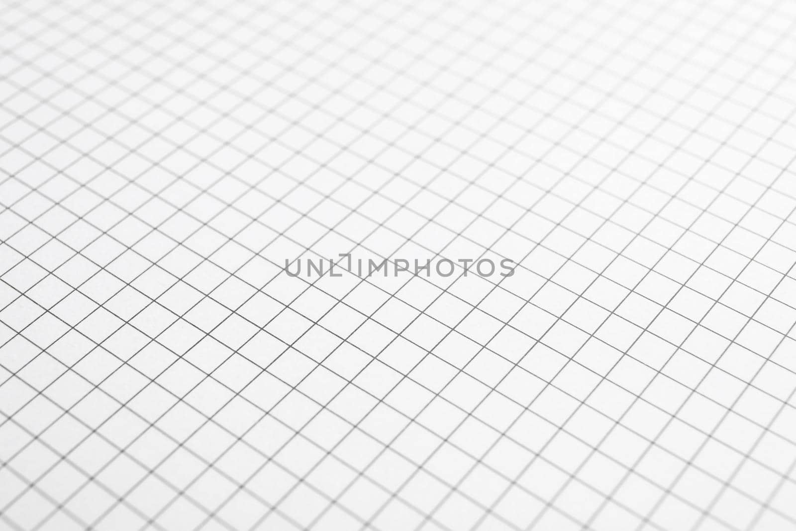 Sheet of notebook with grid texture as background, space for text by AtlasCompany