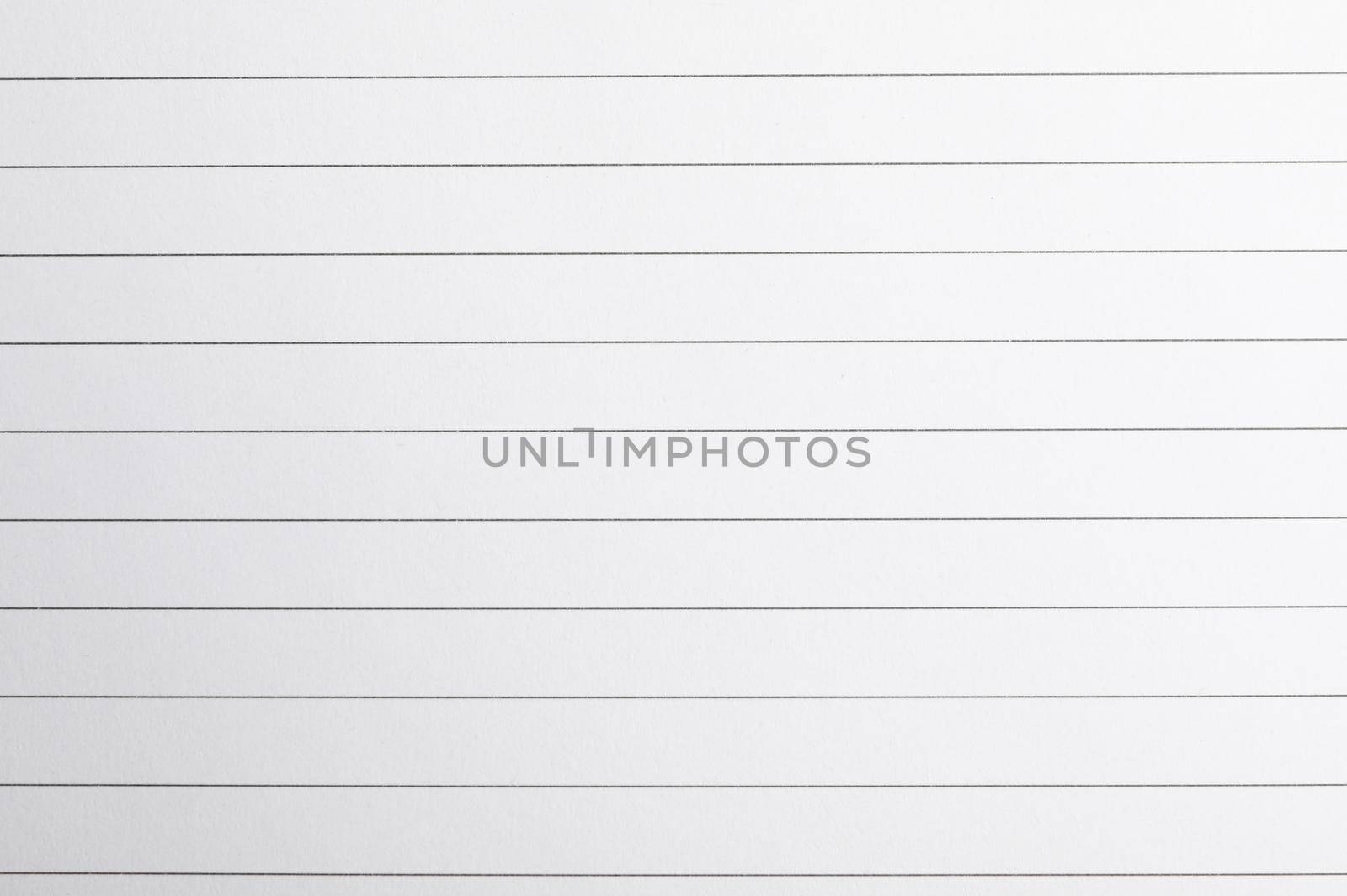 Sheet of notebook with horizontal texture as background, space for text