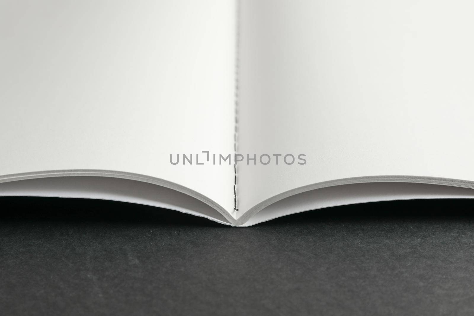 Clean copybook on black background, space for text by AtlasCompany