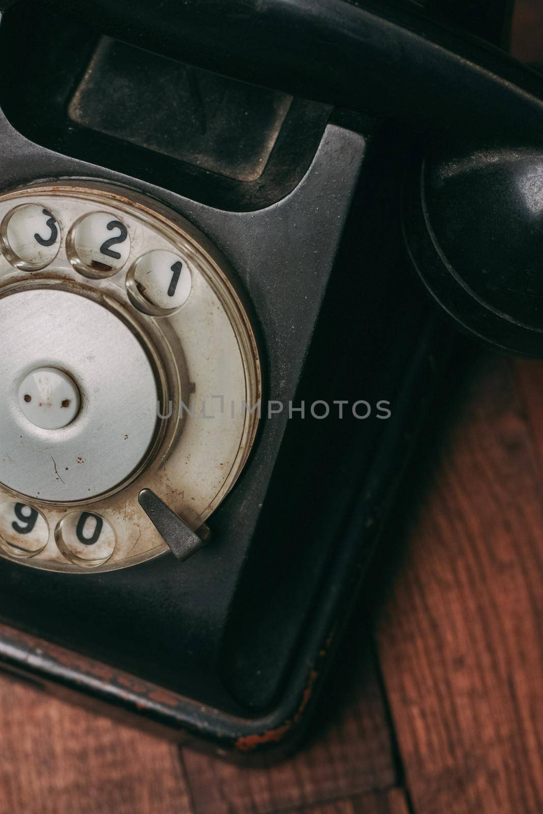 retro telephone old technology communication antique wood background by SHOTPRIME