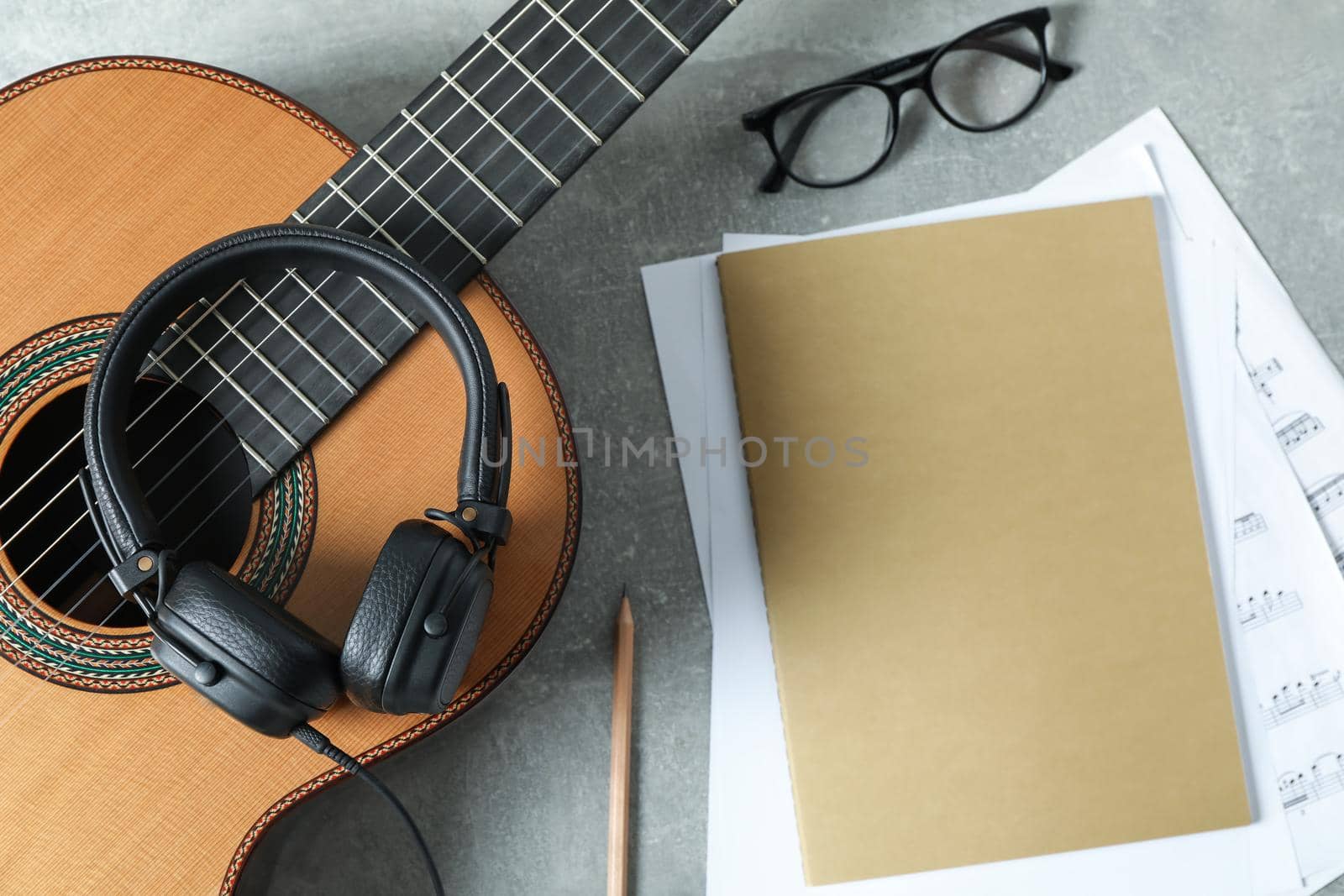 Music maker composition on grey background, top view by AtlasCompany