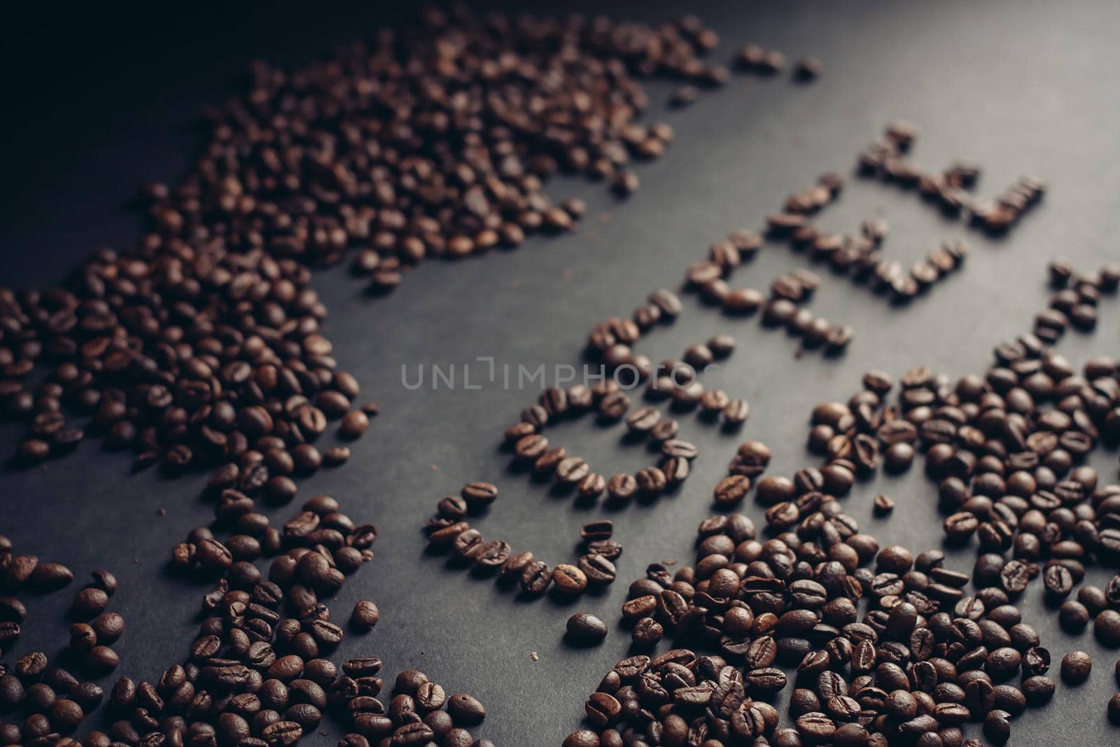 The word written from coffee beans drink aroma arabica cappuccino. High quality photo