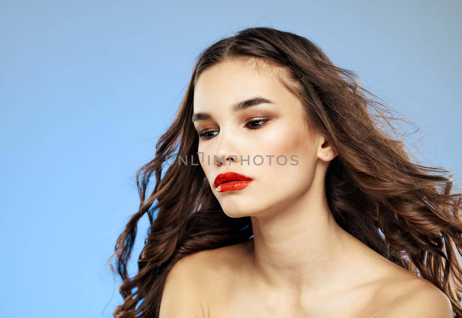 adorable lady with red lips portrait bare shoulders cropped view. High quality photo