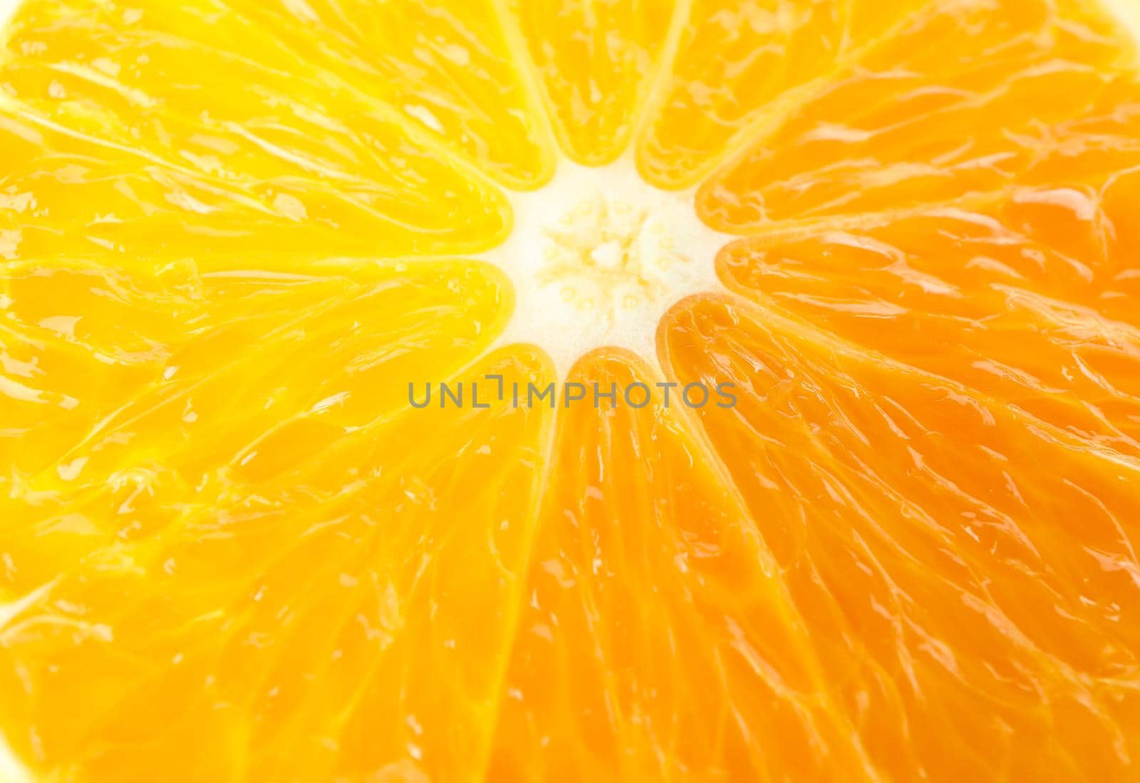 Fresh slice orange as background, space for text and closeup. Fresh citrus fruit