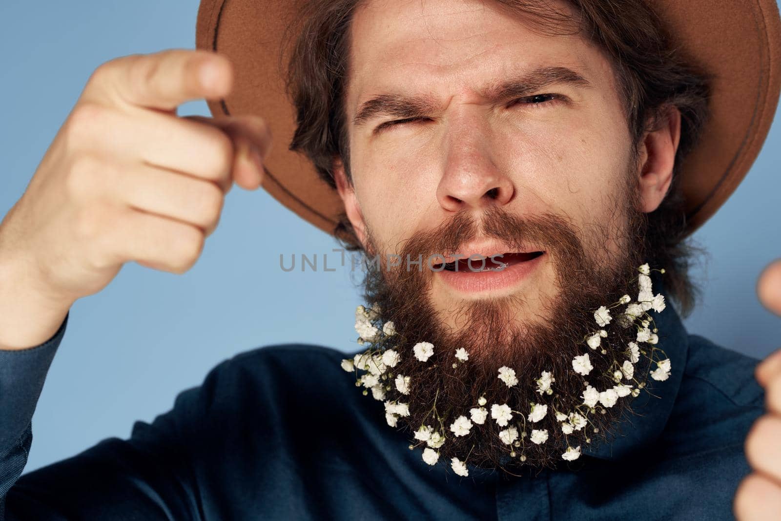 Bearded man in shirt hat flowers elegant style by SHOTPRIME