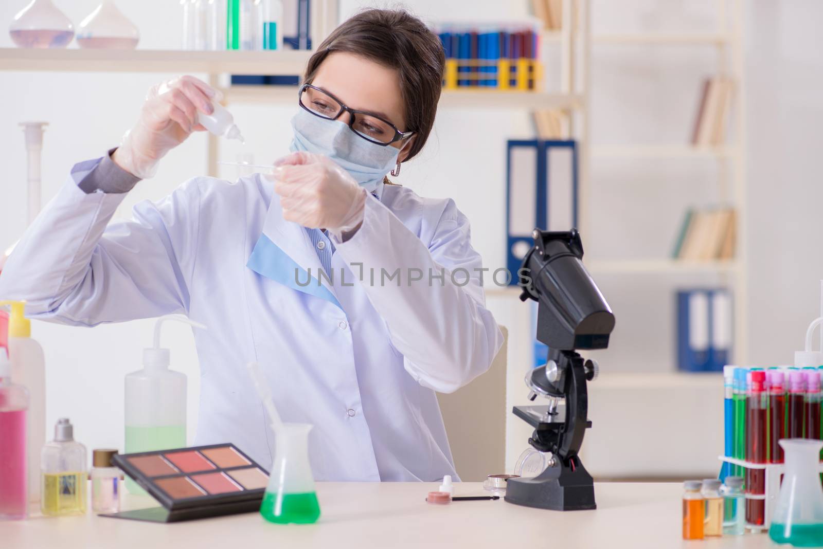 Lab chemist checking beauty and make-up products