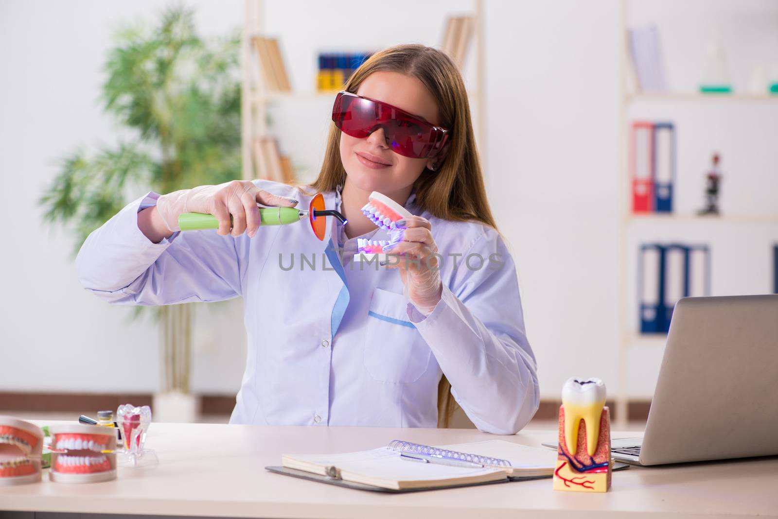 Dentistry student practicing skills in classroom