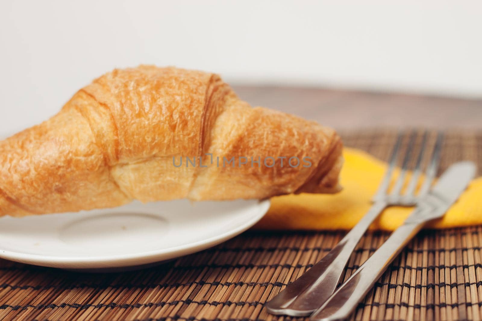 fresh croissants on the table breakfast food ration morning. High quality photo