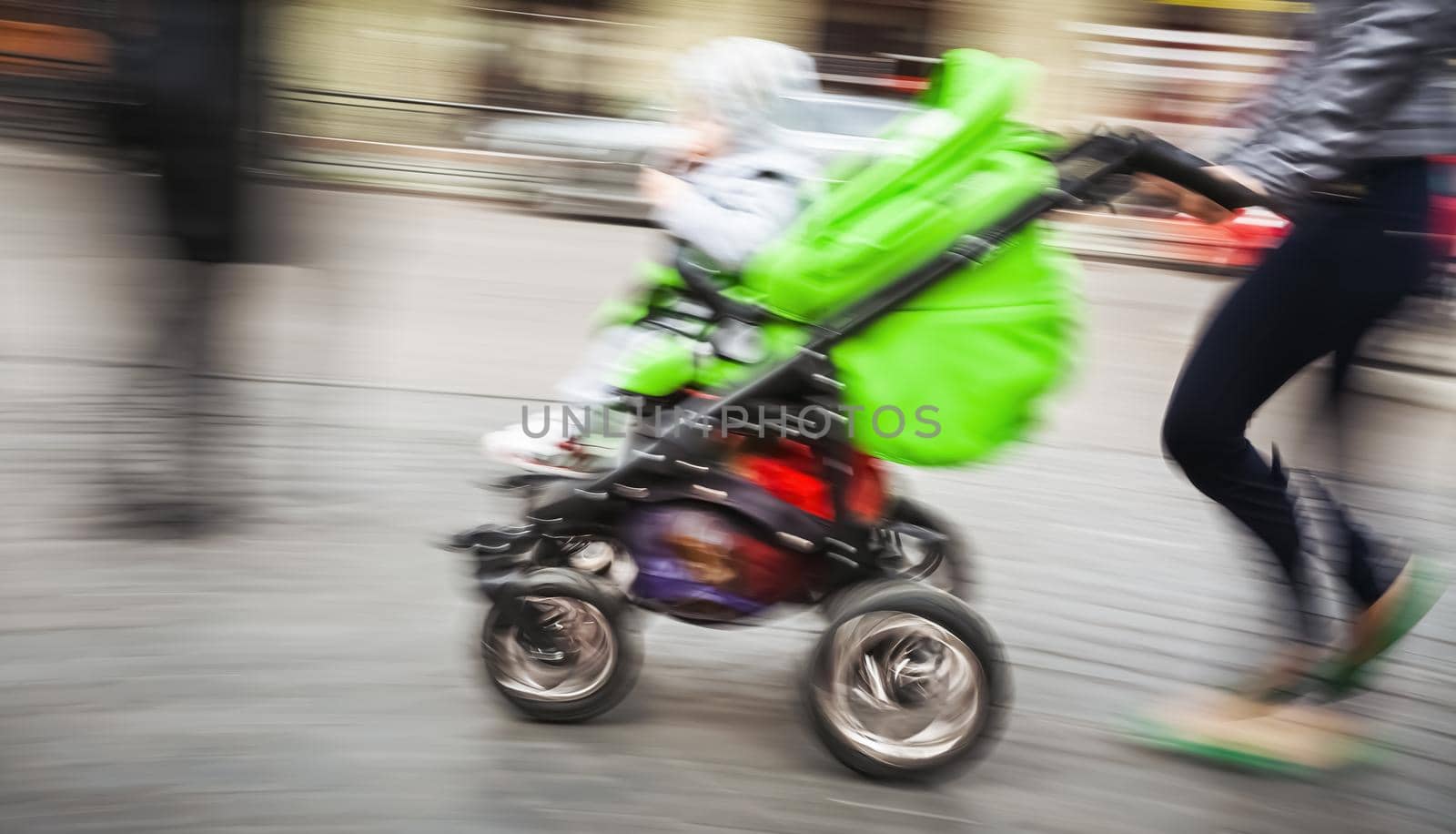 Mother with small children and a pram by palinchak