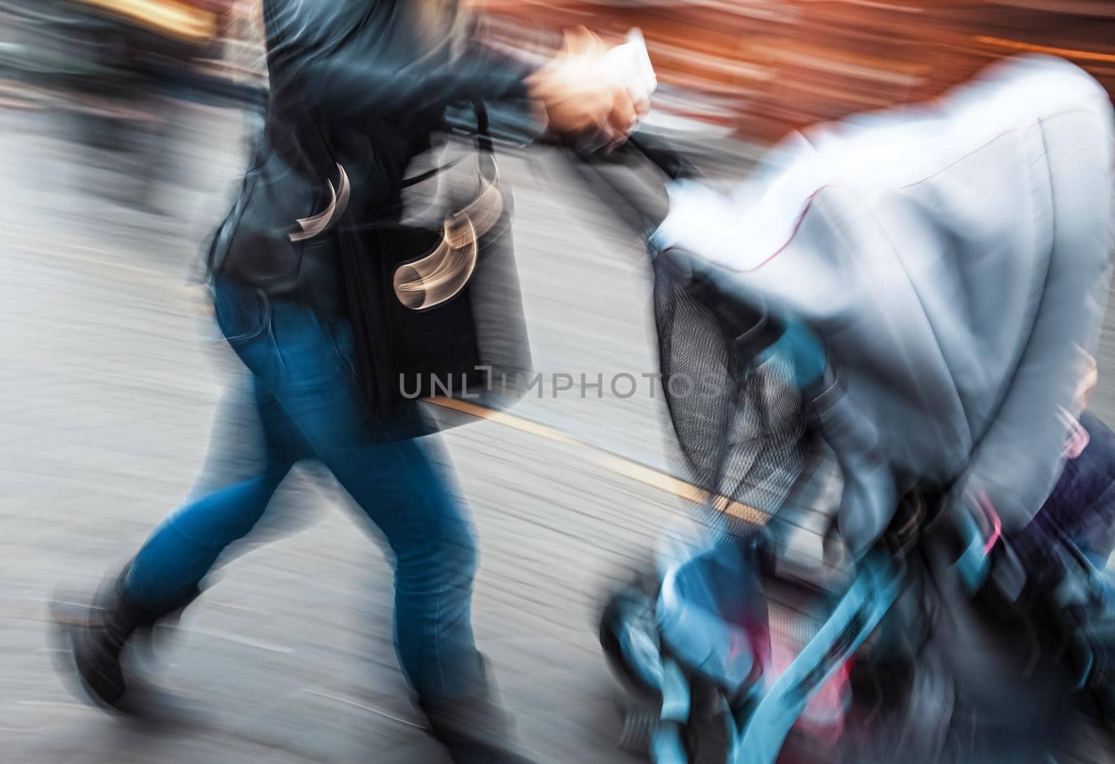 Mother with small children and a pram by palinchak