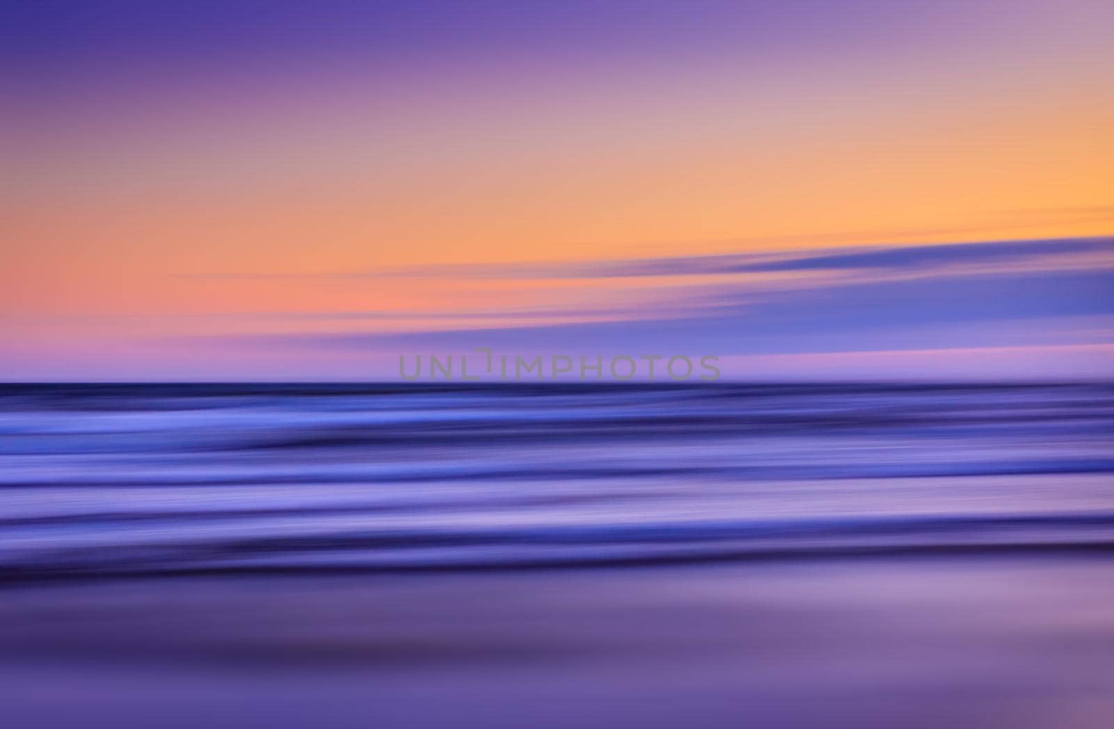 Abstract blurred sea landscape and sunset cloudy sky background