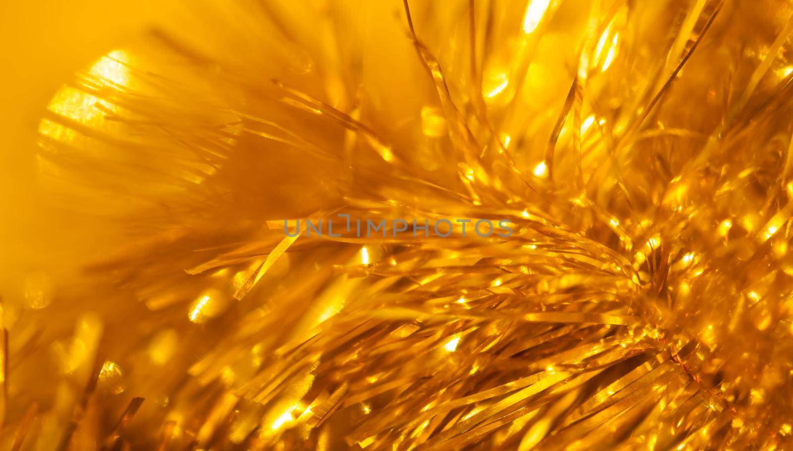 Color lights. Orange abstract blurred background with light flares