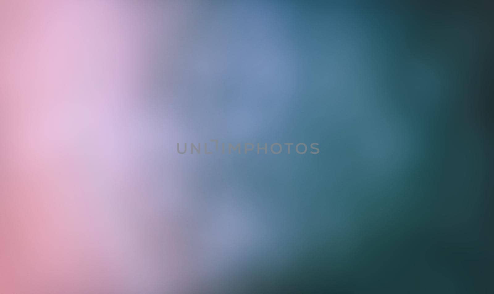 Defocused blurred image of colorful smoke on dark background. Texture and abstract art