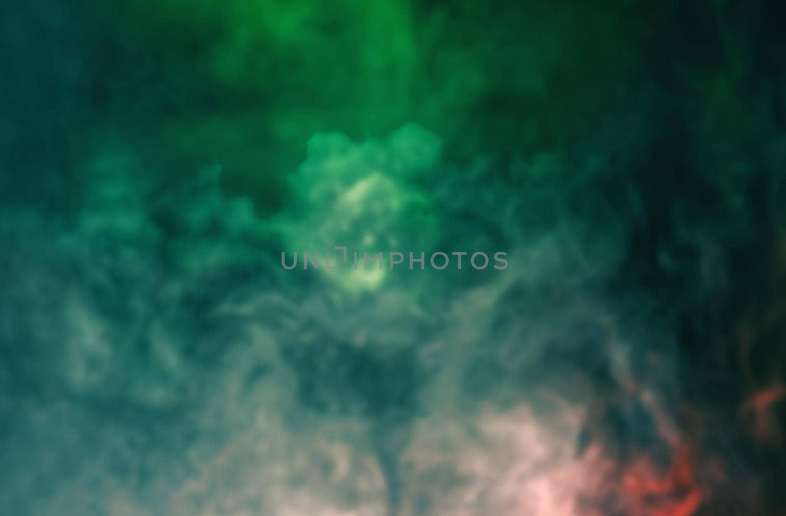 Soft focus abstract image of colorful smoke on dark background. Texture and abstract art