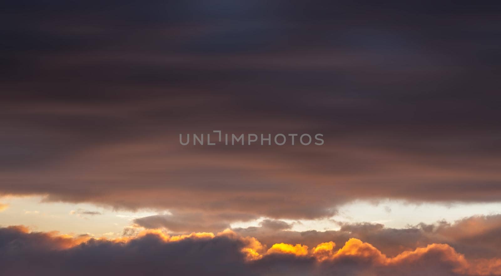 Abstract blurred sunset cloudy sky background