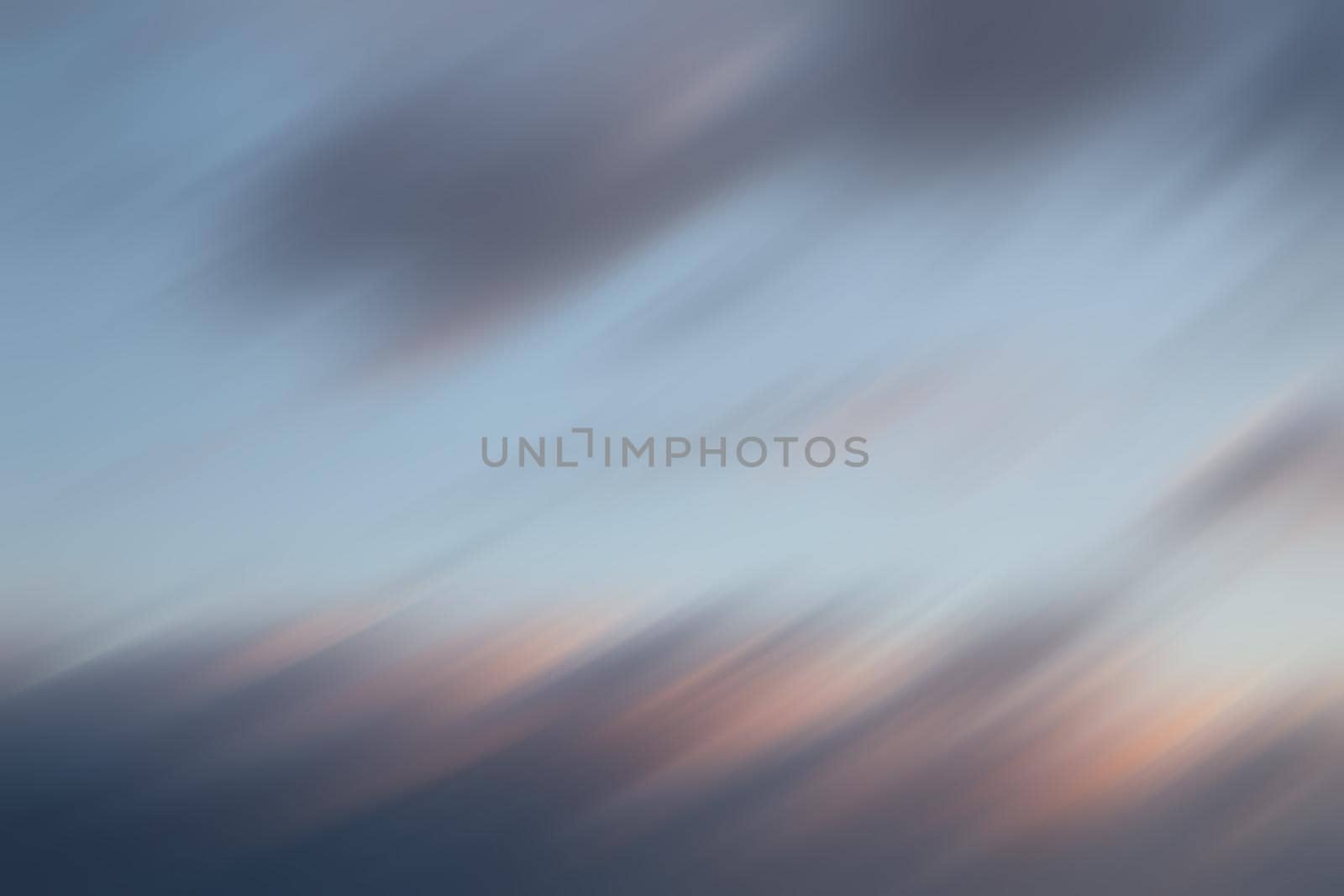 Abstract blurred sunset cloudy sky background