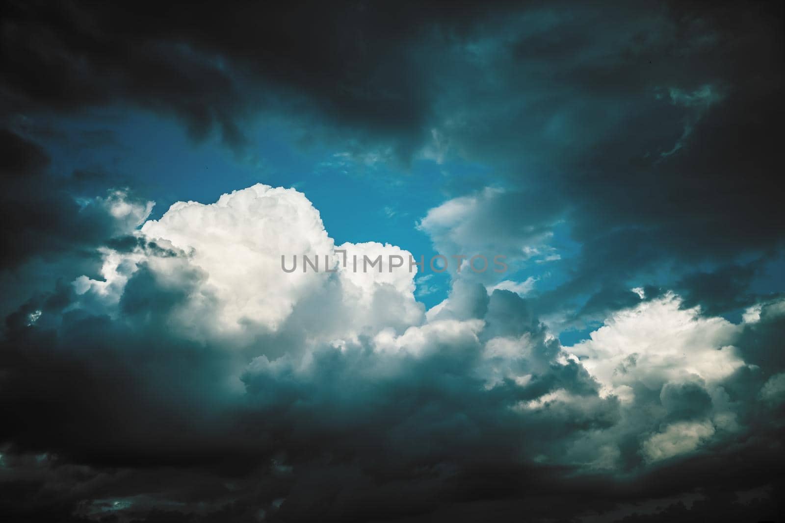 Dramatic sky with stormy clouds. Nature background