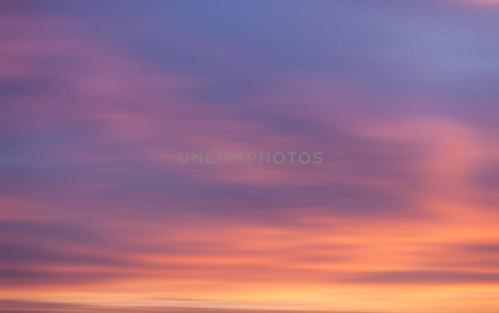 Blurred nature background. Blurred sunset cloudy sky background