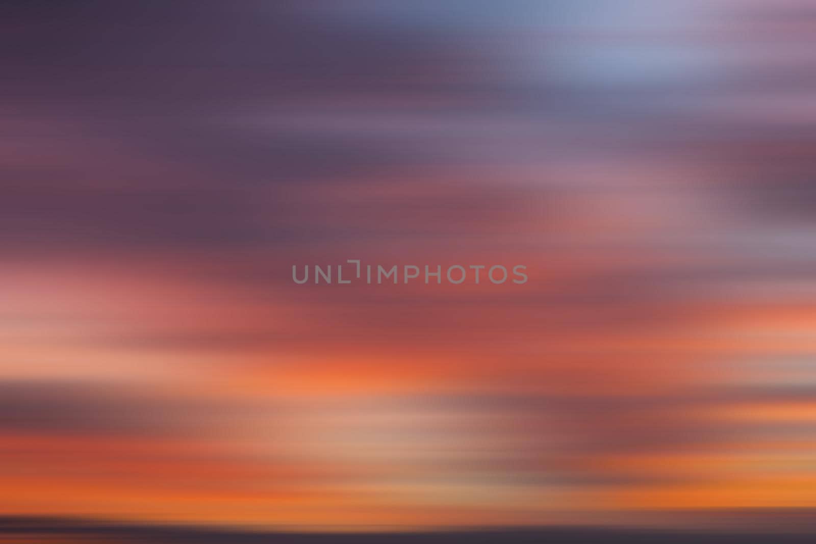 Blurred sunset cloudy sky background