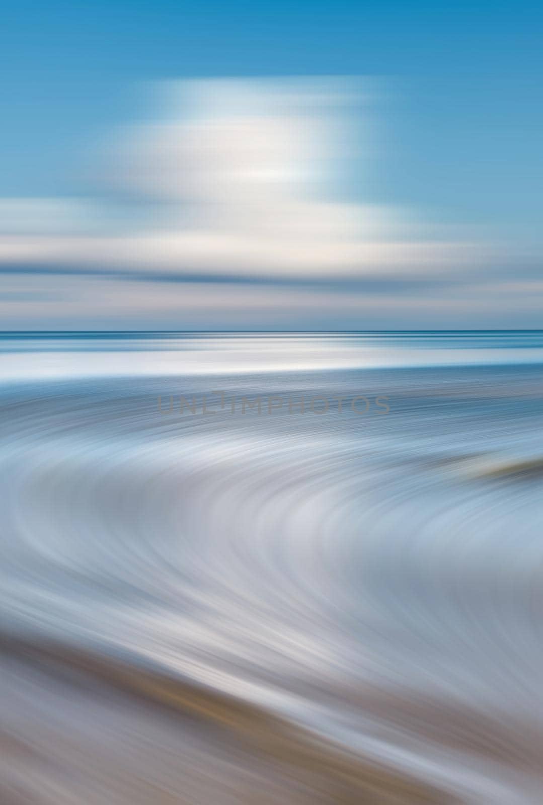 Blurred sea background. Nature background with water and clouds